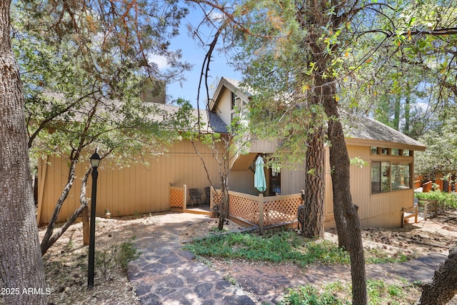 4511 N Ponderosa Dr, Pine, AZ 85544 - view of side of home featuring a chimney and a shingled roof