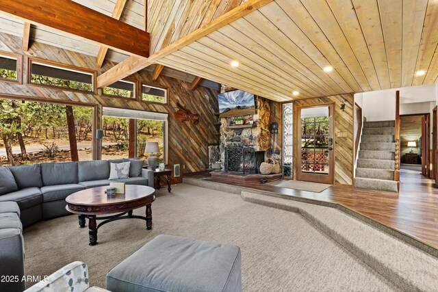 4511 N Ponderosa Dr, Pine, AZ 85544 - living area with wooden walls, wooden ceiling, a fireplace, stairs, and recessed lighting