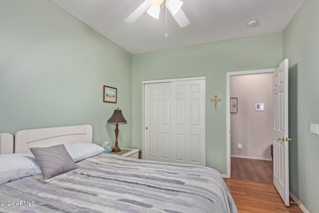 bedroom featuring ceiling fan and hardwood / wood-style floors