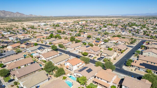 birds eye view of property with a mountain view