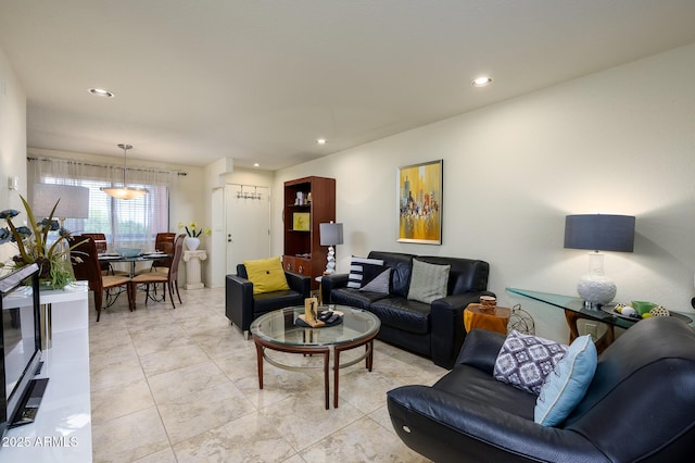 living area featuring recessed lighting