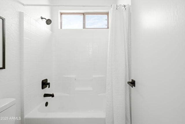 bathroom with toilet and shower / bathtub combination with curtain