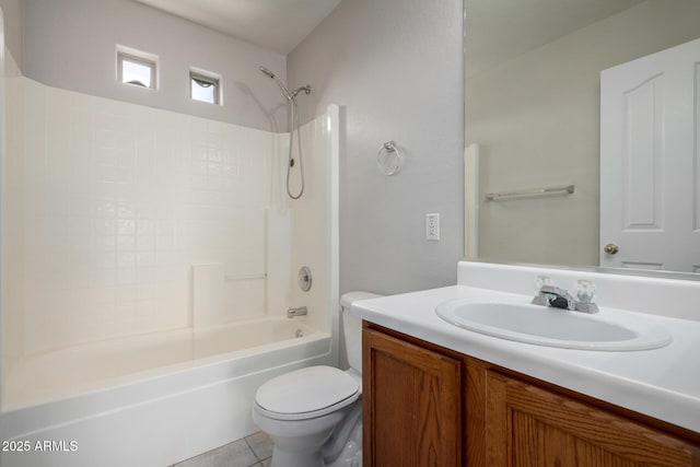 bathroom featuring toilet, tile patterned floors, shower / tub combination, and vanity