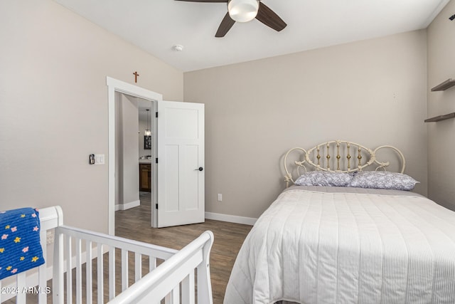 bedroom featuring wood-type flooring and ceiling fan