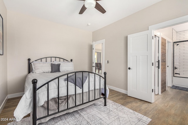 bedroom featuring wood-type flooring and ceiling fan