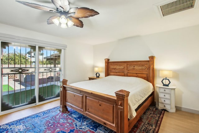 bedroom with ceiling fan, access to exterior, and light wood-type flooring