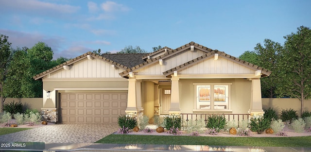 craftsman-style home with a garage and covered porch