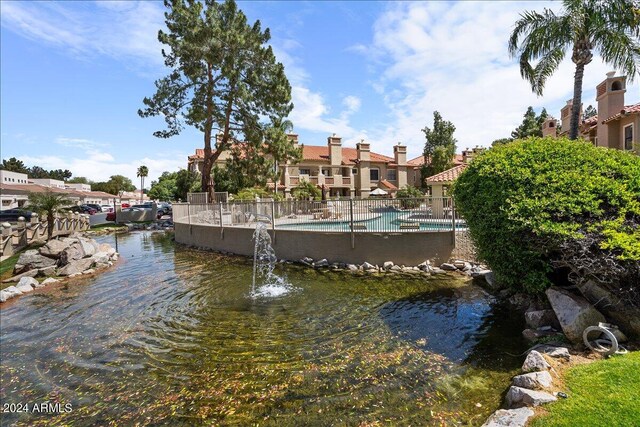 dock area featuring a community pool