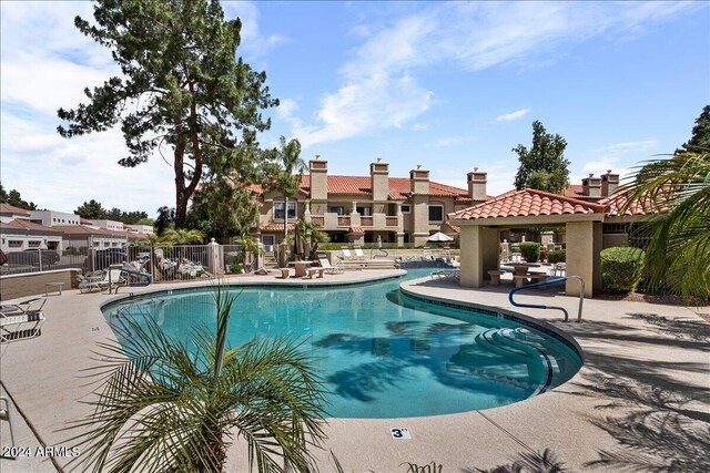 view of swimming pool featuring a patio area