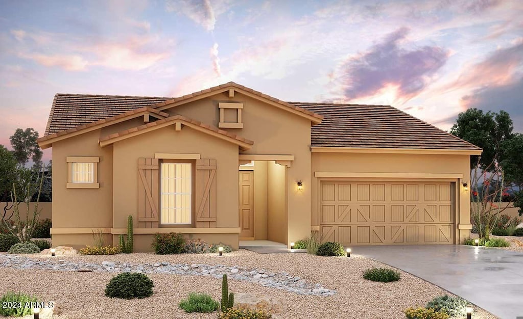 view of front of property with a garage