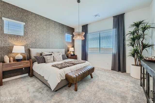 carpeted bedroom with baseboards