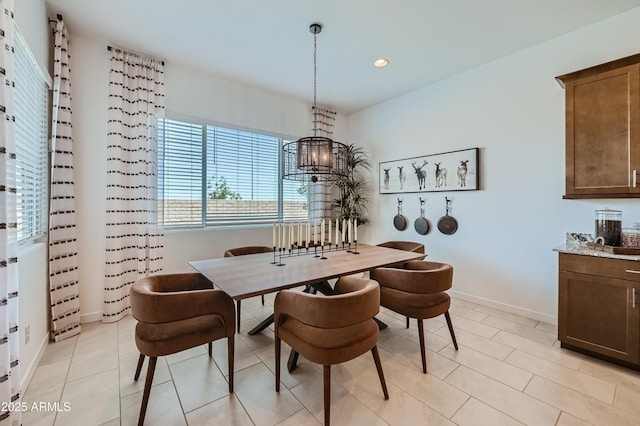 dining area featuring baseboards, recessed lighting, and light tile patterned floors