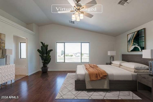 bedroom with hardwood / wood-style floors, ceiling fan, and vaulted ceiling