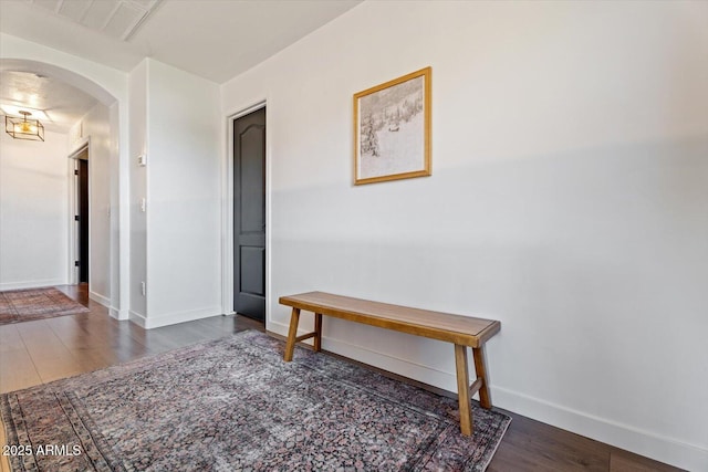 unfurnished room featuring dark hardwood / wood-style flooring