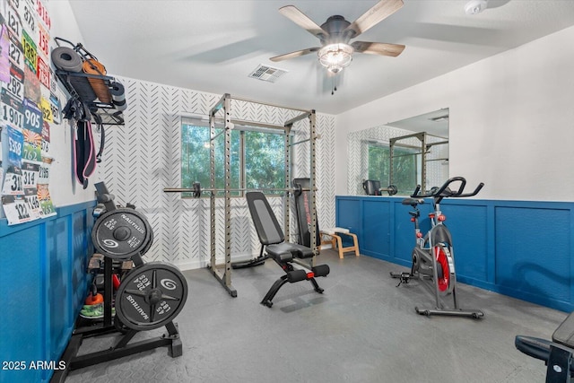 workout area with ceiling fan