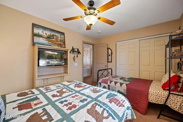 bedroom with ceiling fan and a closet