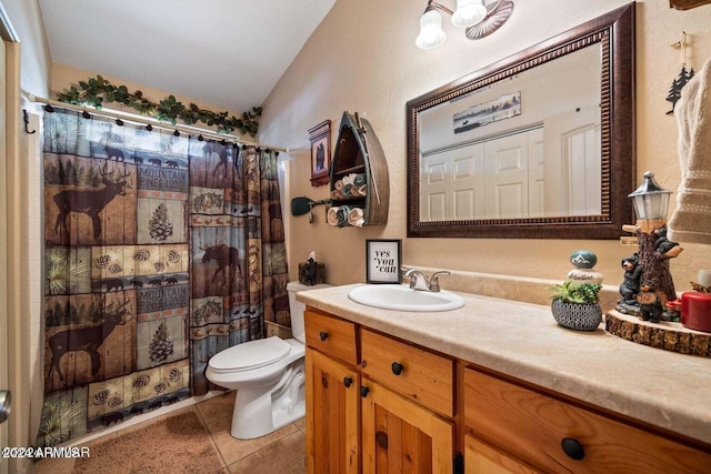 bathroom featuring tile patterned floors, walk in shower, vanity, vaulted ceiling, and toilet