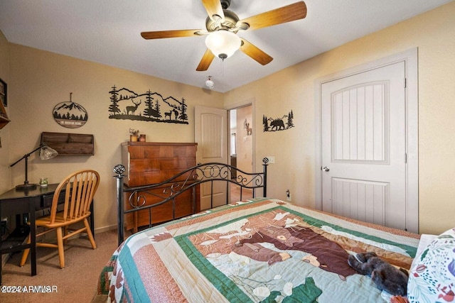 bedroom featuring ceiling fan and carpet floors