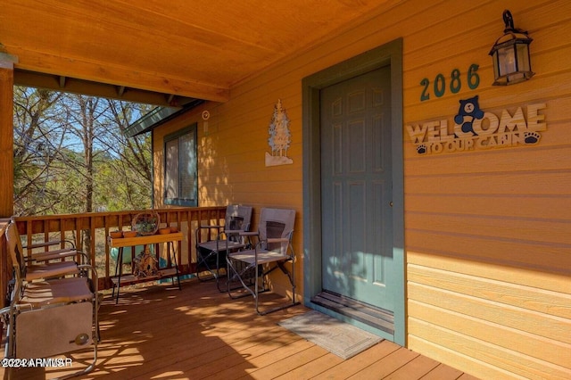 wooden deck with a porch