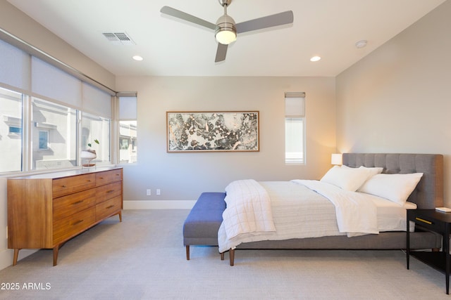 bedroom with ceiling fan, light carpet, recessed lighting, baseboards, and visible vents