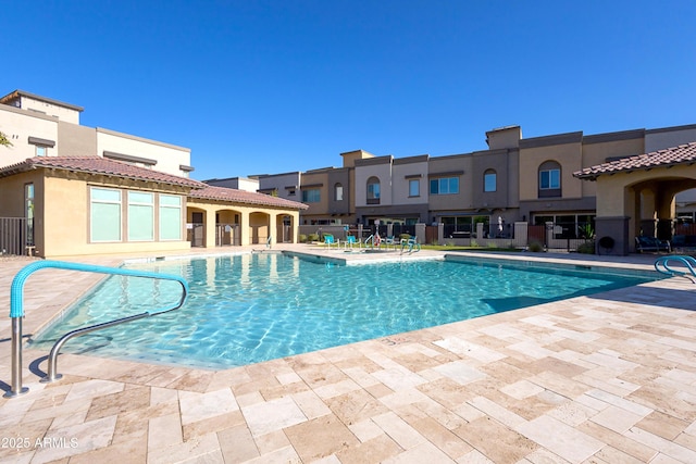 pool with a patio area