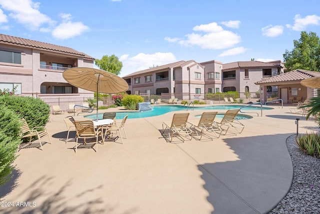 view of swimming pool featuring a patio