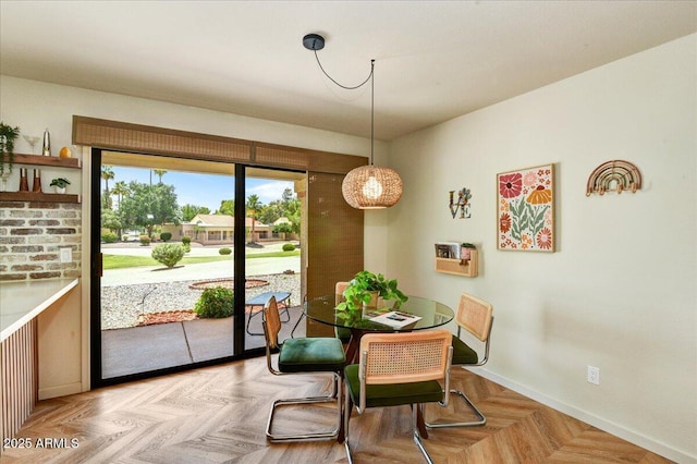19025 N 96th Ave, Peoria, AZ 85382 - dining room featuring baseboards and a chandelier
