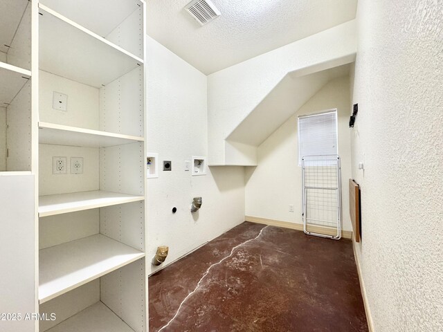 interior space with visible vents, laundry area, hookup for a washing machine, hookup for a gas dryer, and electric dryer hookup