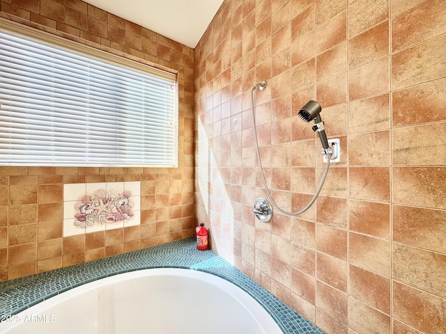 full bathroom with tiled shower and a bathtub