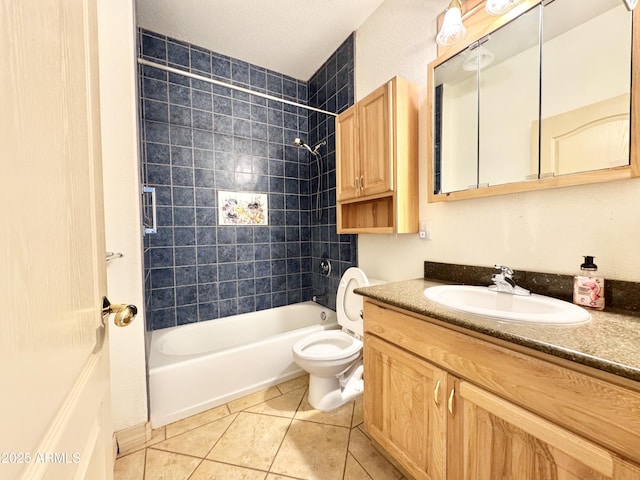 full bath with tile patterned flooring, toilet, vanity, and bathtub / shower combination