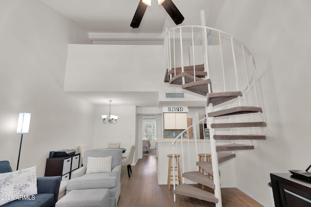 2333 E Southern Ave Unit 2016, Tempe, AZ 85282 - staircase with a high ceiling, wood finished floors, ceiling fan, and a chandelier