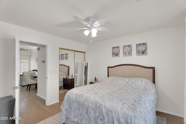 2333 E Southern Ave Unit 2016, Tempe, AZ 85282 - bedroom featuring wood finished floors, a closet, and ceiling fan