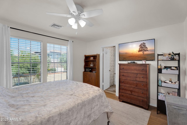 2333 E Southern Ave Unit 2016, Tempe, AZ 85282 - bedroom with light wood-style floors and a ceiling fan