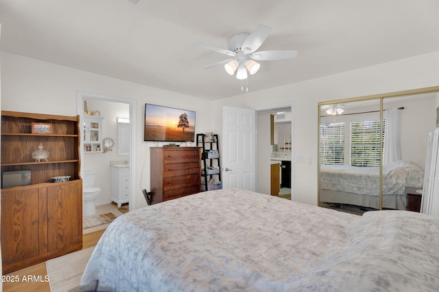 2333 E Southern Ave Unit 2016, Tempe, AZ 85282 - bedroom with light wood-style floors, a closet, connected bathroom, and a ceiling fan
