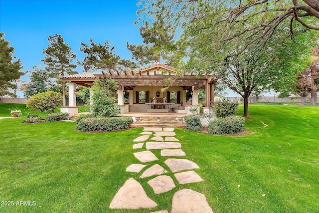 rear view of property with stucco siding, fence, a lawn, and a pergola