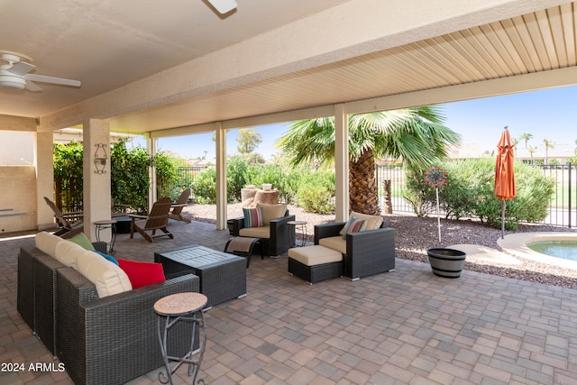 view of patio / terrace with an outdoor living space and ceiling fan