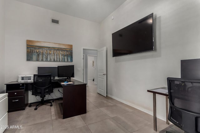 1884 E Stephens Dr, Tempe, AZ 85283 - office area featuring light tile patterned flooring, baseboards, and a towering ceiling