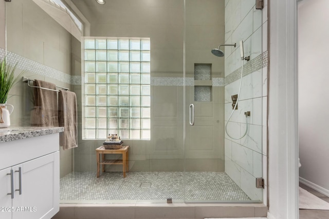 1884 E Stephens Dr, Tempe, AZ 85283 - bathroom featuring vanity, healthy amount of natural light, and a shower stall