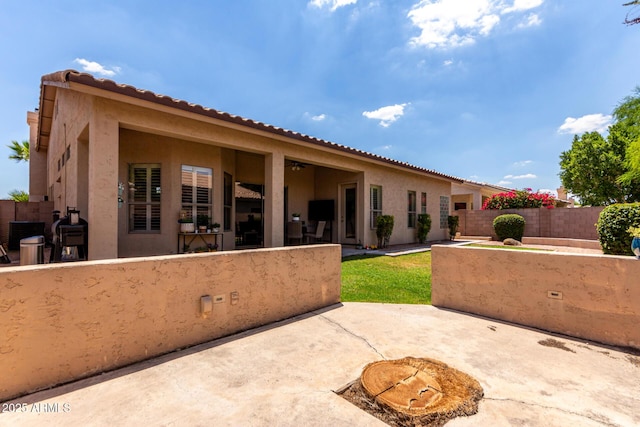 1884 E Stephens Dr, Tempe, AZ 85283 - rear view of house with stucco siding, a patio area, and a tiled roof