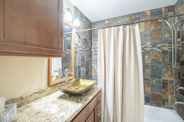 full bathroom with shower / bath combination with curtain and vanity