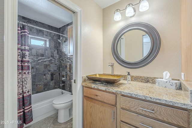 full bathroom with toilet, tile patterned floors, shower / tub combo with curtain, and vanity