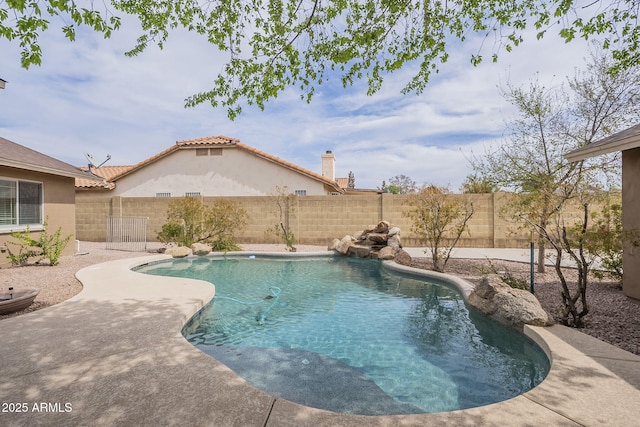 view of swimming pool with a patio area, a fenced backyard, and a fenced in pool