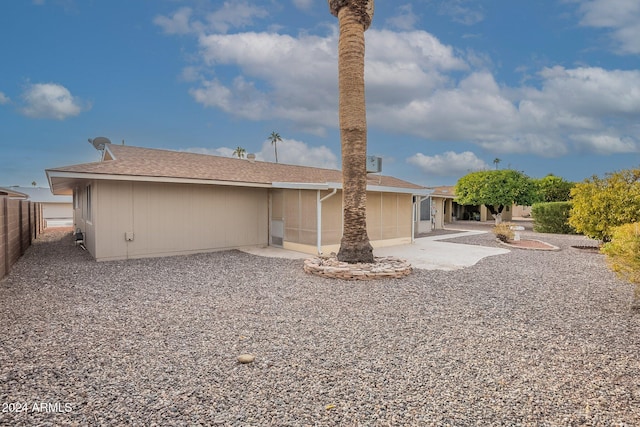 back of property featuring a patio area