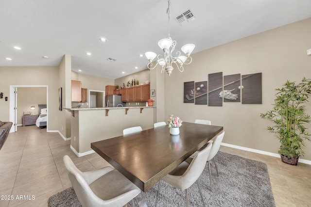 3131 E Legacy Dr Unit 1032, Phoenix, AZ 85042 - dining space with light tile patterned flooring, a chandelier, recessed lighting, and baseboards