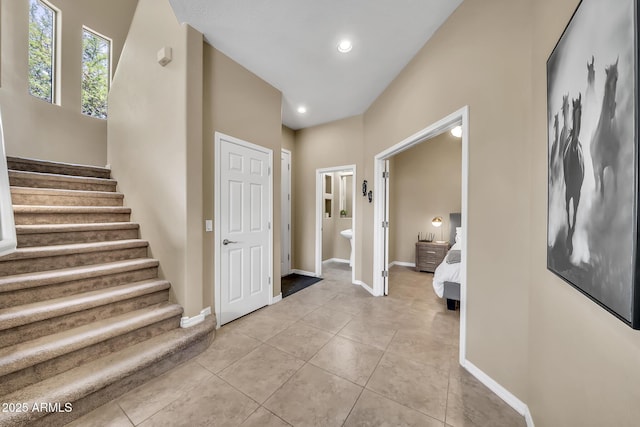 3131 E Legacy Dr Unit 1032, Phoenix, AZ 85042 - foyer with stairs, light tile patterned floors, recessed lighting, and baseboards