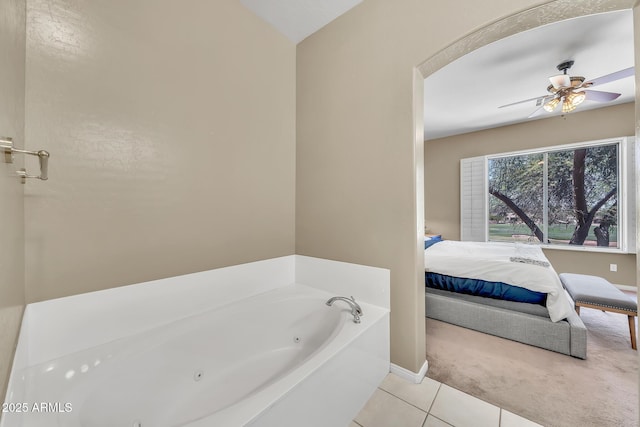 3131 E Legacy Dr Unit 1032, Phoenix, AZ 85042 - full bathroom with a whirlpool tub, ceiling fan, tile patterned floors, ensuite bath, and baseboards