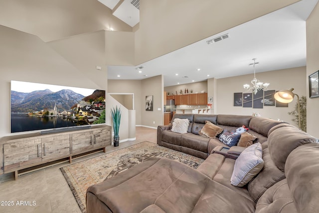3131 E Legacy Dr Unit 1032, Phoenix, AZ 85042 - living area featuring a chandelier, light tile patterned floors, recessed lighting, and baseboards