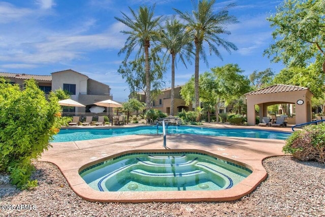 3131 E Legacy Dr Unit 1032, Phoenix, AZ 85042 - community pool featuring a gazebo, a community hot tub, and a patio area