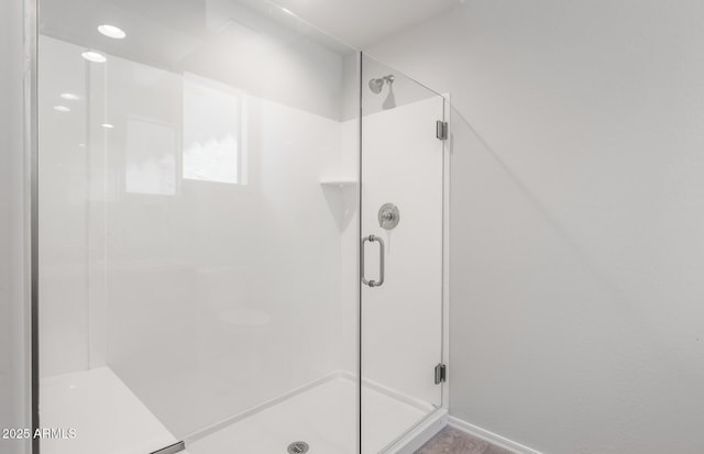 21292 N 270th Dr, Buckeye, AZ 85396 - full bathroom featuring a stall shower and baseboards