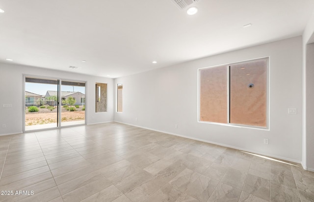 21292 N 270th Dr, Buckeye, AZ 85396 - unfurnished room with recessed lighting, baseboards, and light tile patterned floors